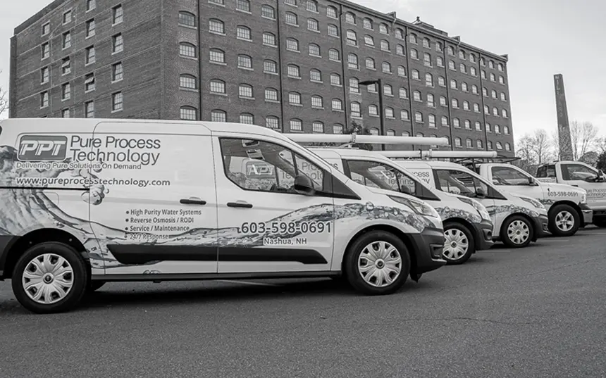Fleet of Pure Process Technology vehicles outside of Nashua, NH location